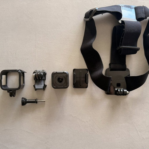 GoPro HERO4 Session action camera used with accessories and head strap