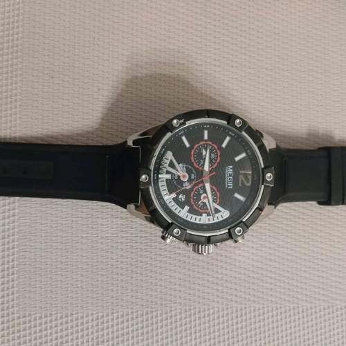 Megir watch used with scratch, battery replacement needed