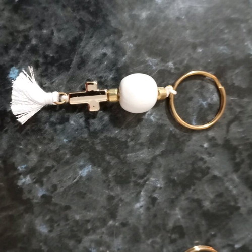 Handmade keychain, with a gold cross, white round wooden bead and white tassel, brand new