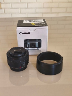 Canon EF 50mm f/1.8 STM lens with hood