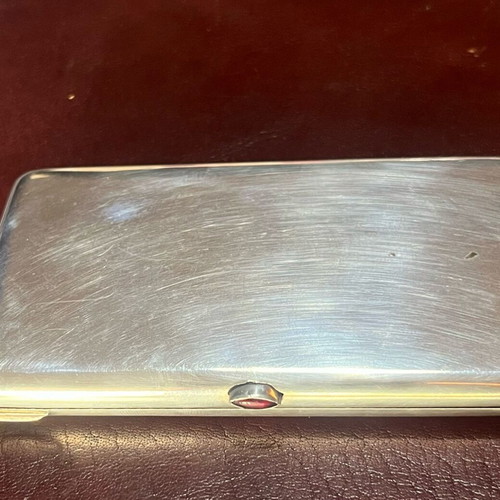Silver cigarette case used with red stone and gold plating
