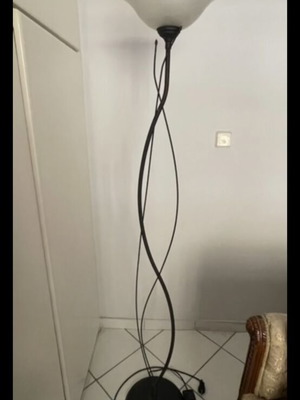 Modern floor lamp like new with black metal base and white glass shade