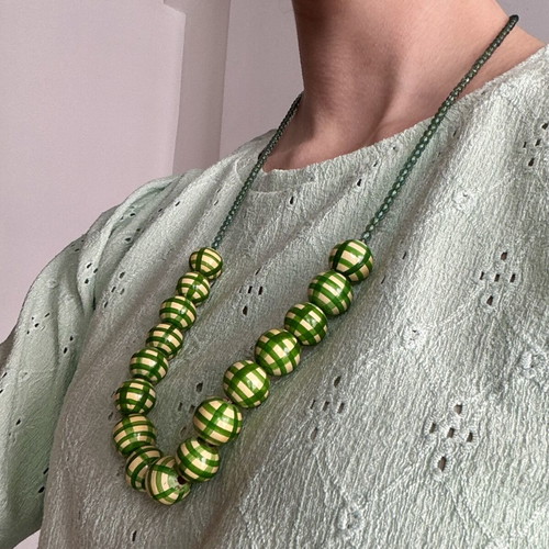 Nice Things necklace used with wooden and plastic beads
