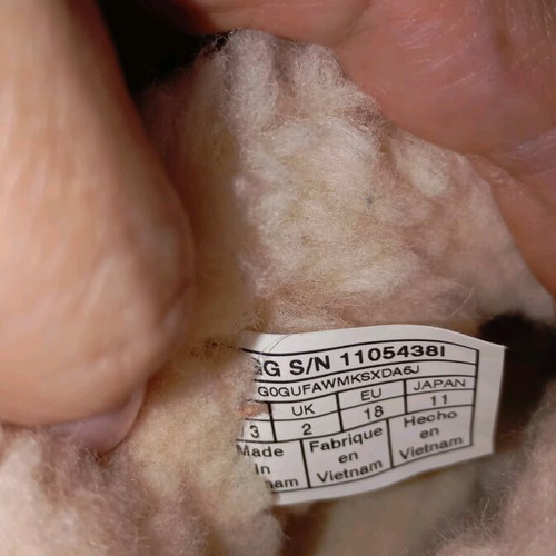 Ugg with fur inside like new