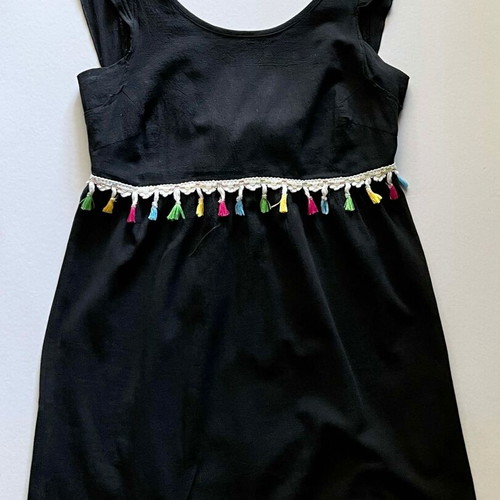 Dress with open back and bow used, black with colorful tassels