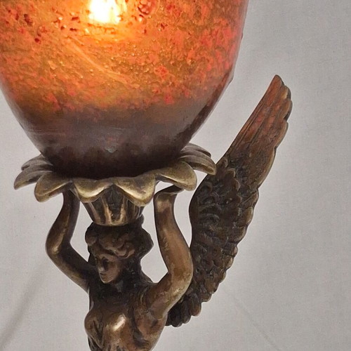 Art Nouveau table lamp with winged female figure and artistic glass shade