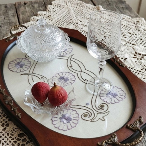 Vintage wooden serving tray with handmade embroidery and brass handles
