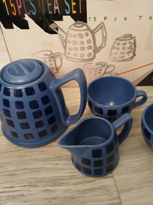 Tea set new with teapot, creamer and 6 cups