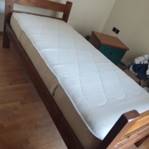 Wooden single bed with anatomical mattress and bedside table like new