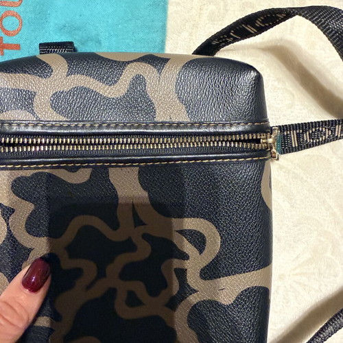 Tous leather crossbody bag like new, black and beige