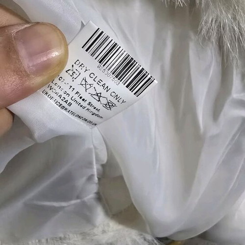 Kate London white faux fur jacket slightly used with small stain