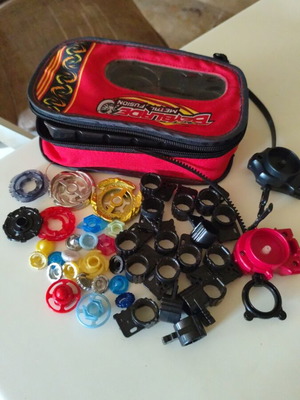 Beyblade Metal Fusion case with keys, tips, metals used