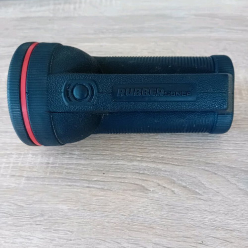 Handheld flashlight used
