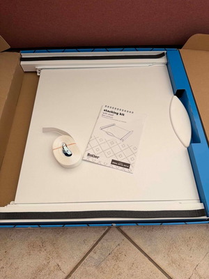 Roller stacking kit with shelf for washer and dryer