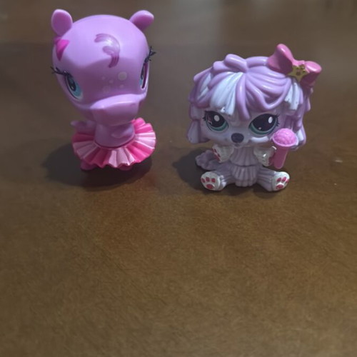 Little Pet Shop figures like new, dog sings, hippo dances