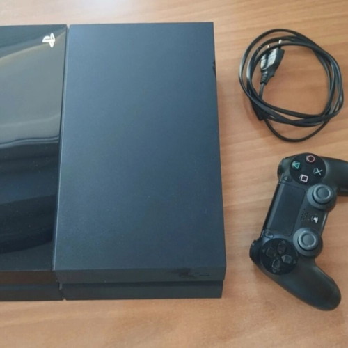 Sony PlayStation 4 Fat 500GB console with DualShock controller