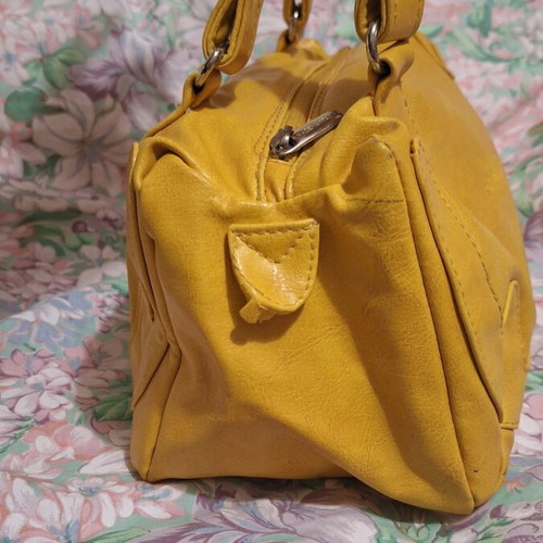 Women's mustard small hand bag used