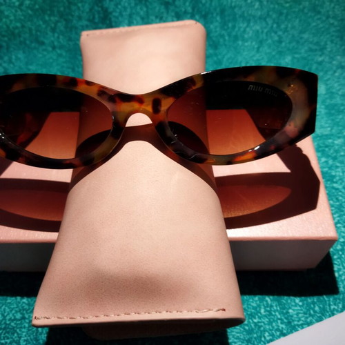 Miu Miu sunglasses new, modern brown and yellow