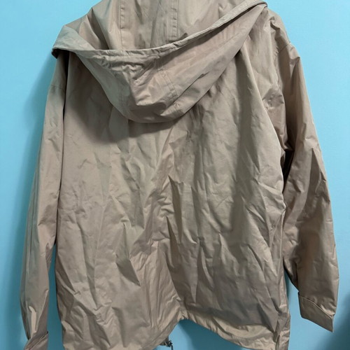 Lightweight waterproof jacket used, beige with hood, size M