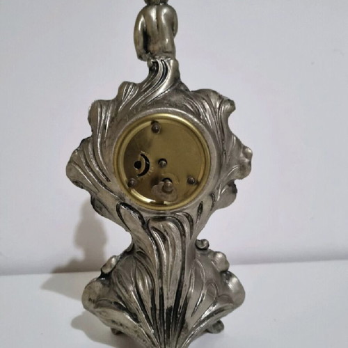 Antique clock used with German mechanism and porcelain decoration