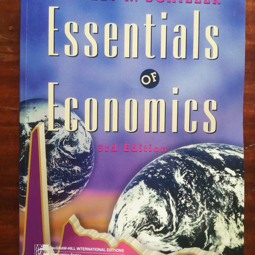 Essentials of Economics 3rd Bradley R. Schiller like new