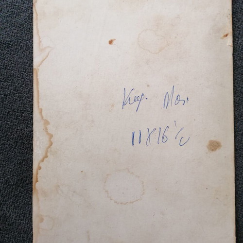 Photograph used, thick cardboard with damages