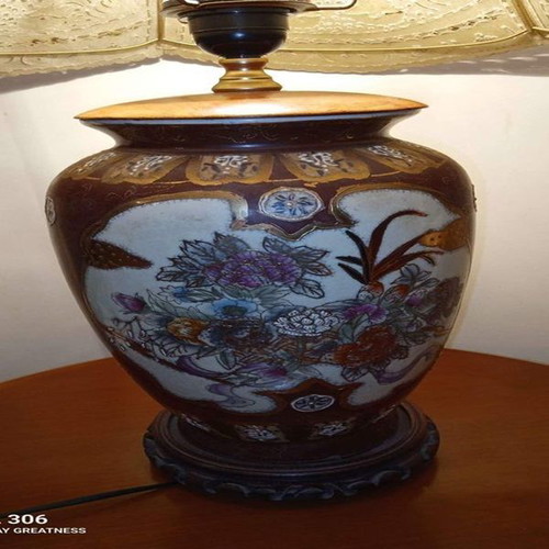 Porcelain lamp used with embossed leather cover