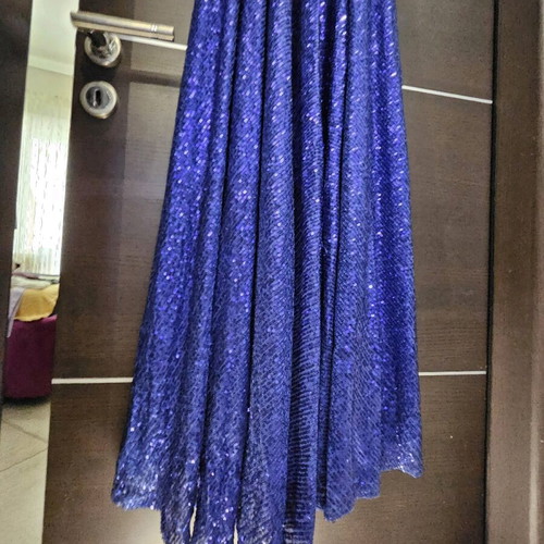 Diamond blue dress like new, open back with shoulder pads