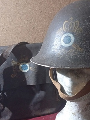 Military bag and helmet used, officer rank