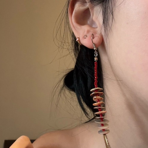 Special hanging earrings made of stainless steel, like new, red