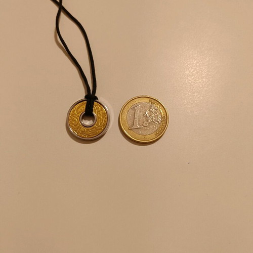 Rebecca pendant necklace used, steel and gold with Polynesian design