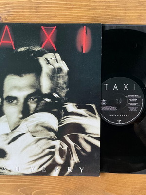 Bryan Ferry Taxi vinyl record used, rock genre