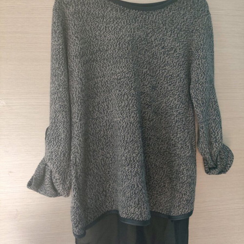 Knitted blouse with transparency used, back detail and leather neck