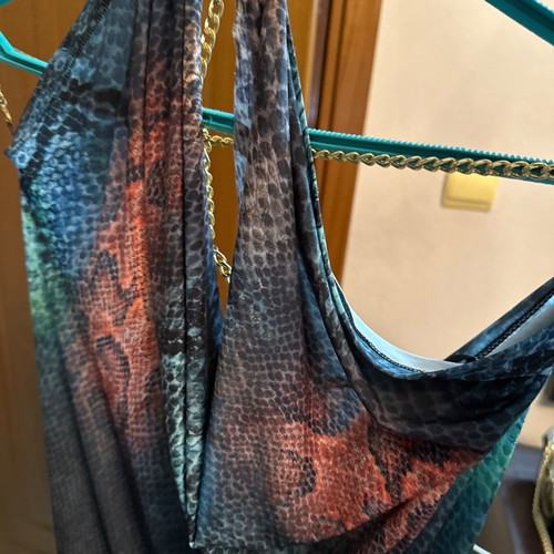 Evening dress used with chain jewelry on the back