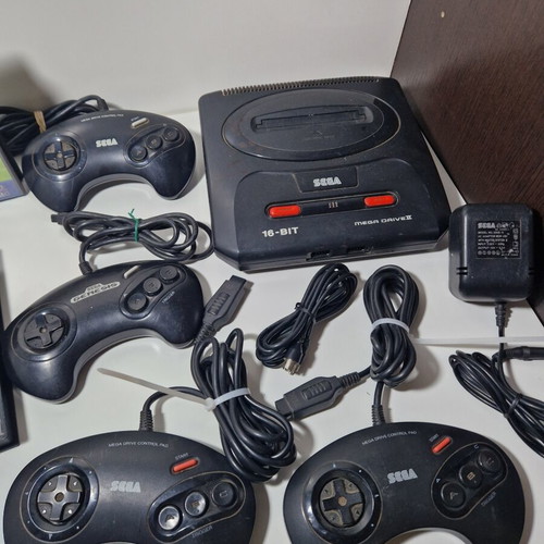 Sega Mega Drive console like new with 3 controllers and games