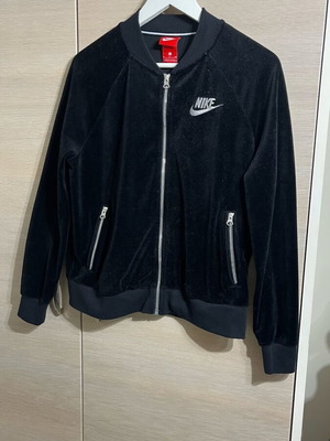 Nike women's black velour jacket used, size S