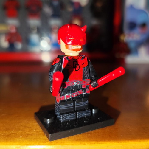 King Daredevil minifigure like new with base and two red billy clubs