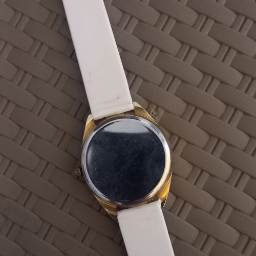 Women's wristwatch with rhinestones, white plastic strap
