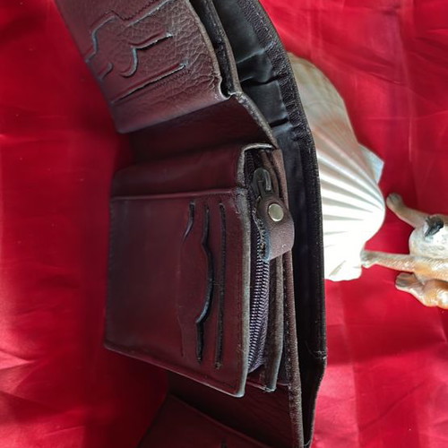 Brown leather wallet used with multiple compartments