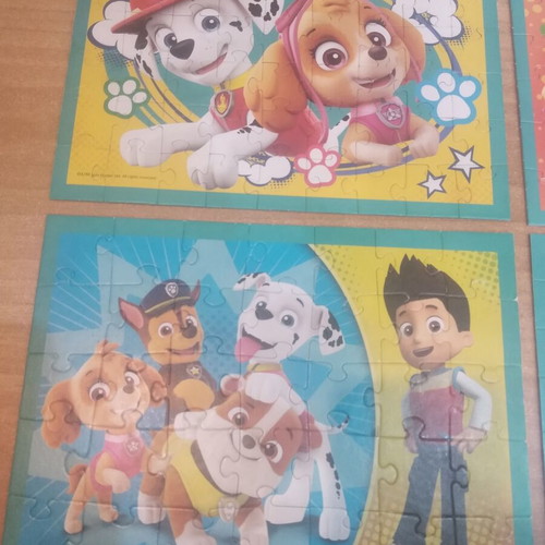 Paw Patrol puzzle set of 4 used with 35 to 70 pieces each