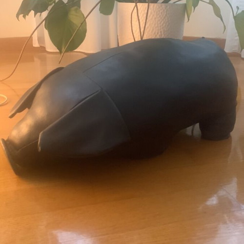 Vintage black leather pig footstool, early 2000s