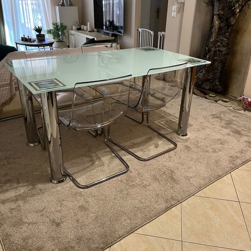 Glass kitchen table with four chairs like new