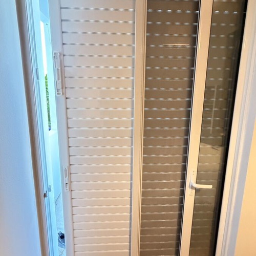 Europa 100 balcony door like new with double glazing, shutters, and accessories