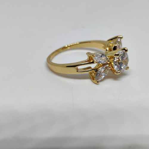 Elegant women's ring with central crystal and decorative petals, like new
