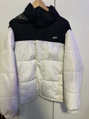 White puffer jacket with black detail and fur, size medium like new