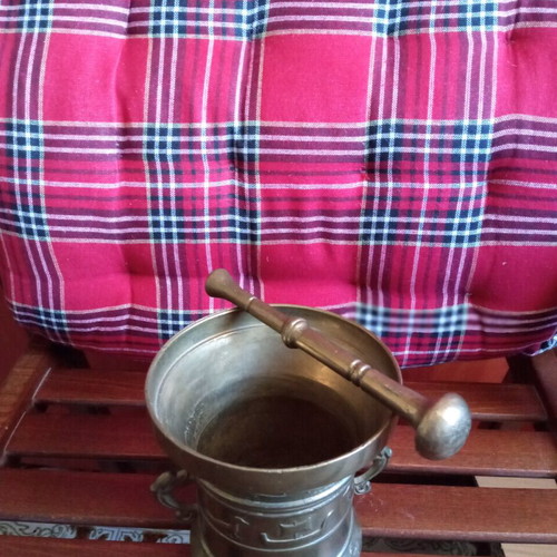 Copper mortar used with embossed decorations