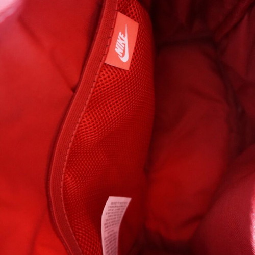 Nike mini backpack like new with gold logo, red
