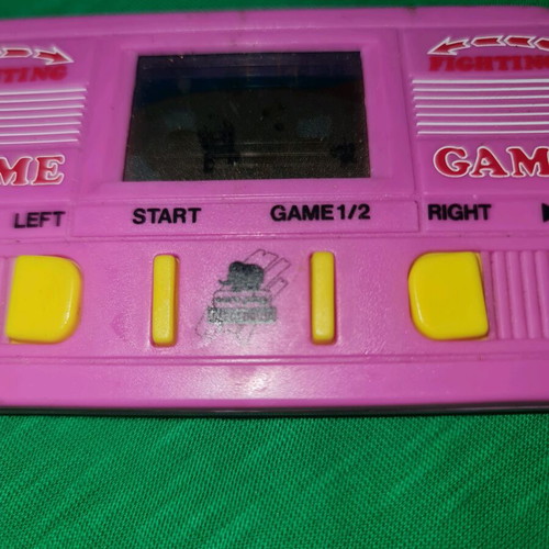 Vintage electronic game missing battery cover screw and stand