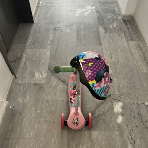 Minnie Scooter with Helmet like new, lightly used