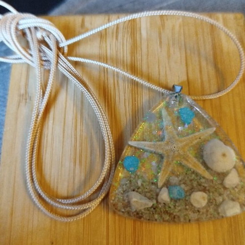 Handmade pendant with resin and beige sea elements new